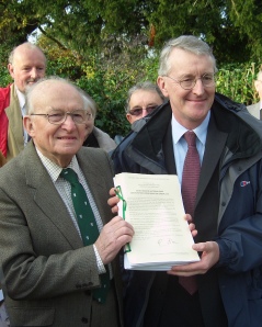 Hilary Benn MP with Robin Crane, chairman of the South Downs Campaign holding a signed copy of the Confirmation Order, 12 November, 2009